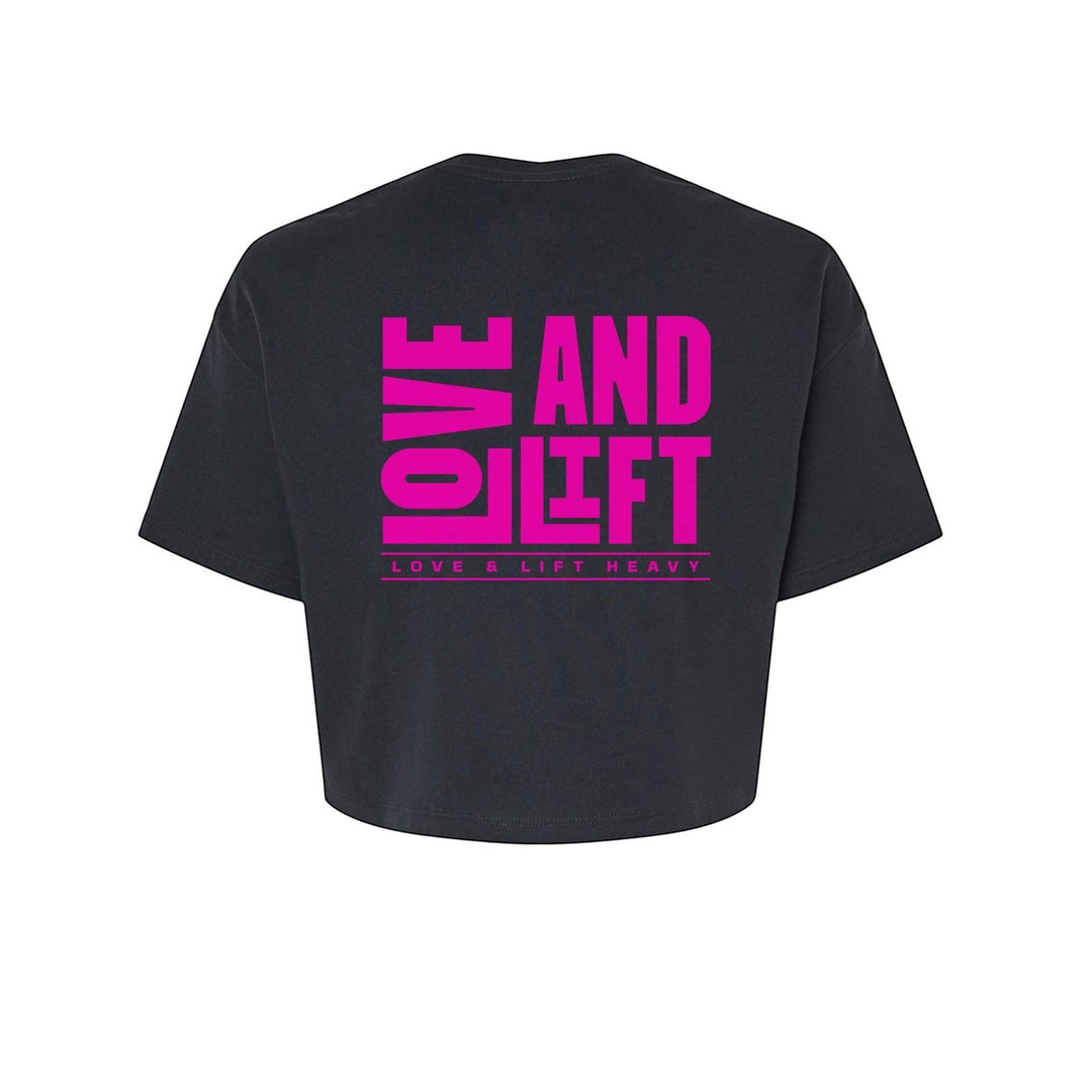 JSD Apparel black 100% cotton cropped t-shirt with bold pink "LOVE AND LIFT" graphic and "LOVE & LIFT HEAVY" text.