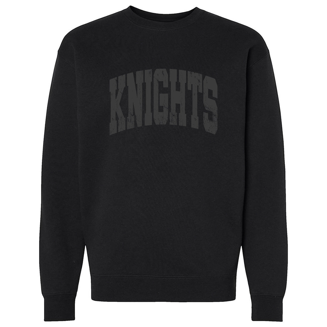 JSD Apparel black fleece crewneck sweatshirt featuring a distressed tonal black KNIGHTS collegiate arch graphic.