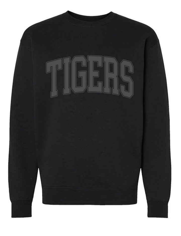 JSD Apparel black crewneck sweatshirt featuring bold collegiate-style TIGERS arch lettering on the chest.