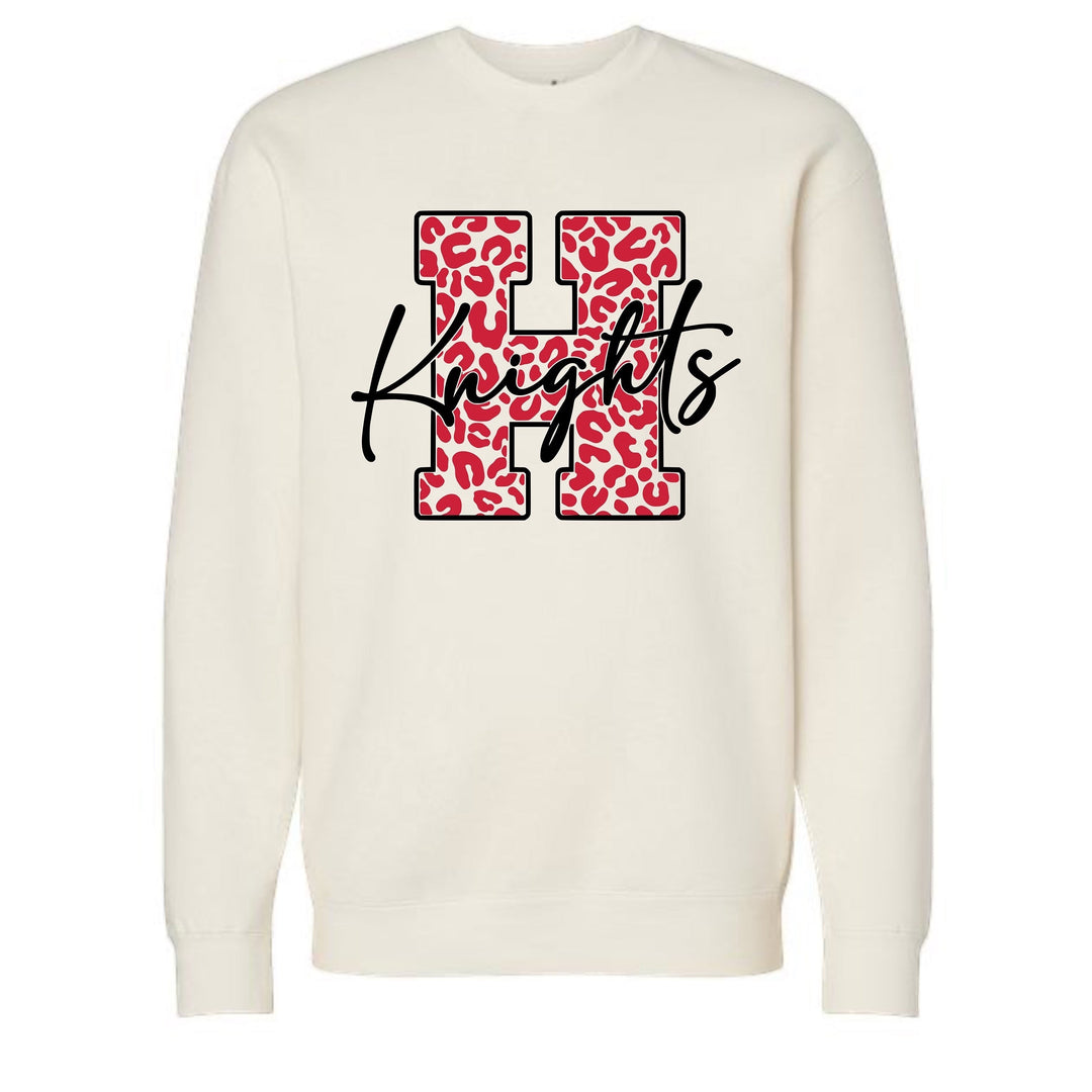 JSD Apparel cream heavyweight crewneck sweatshirt with a red leopard-print H and black script Knights text