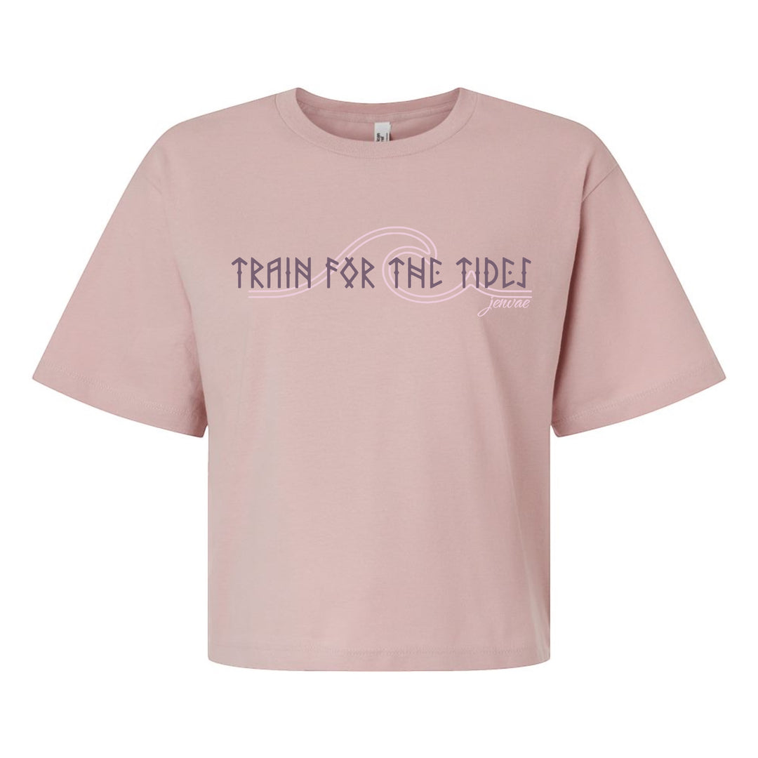 JSD Apparel dusty rose cotton blend cropped tee with "Train for the Tides" graphic and crew neckline.