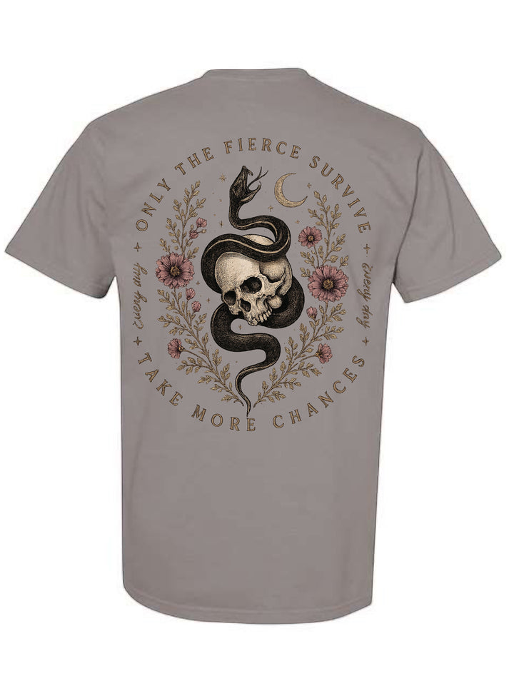 JSD Apparel grey unisex tee featuring a back graphic of a skull, serpent, wildflowers, and celestial details.