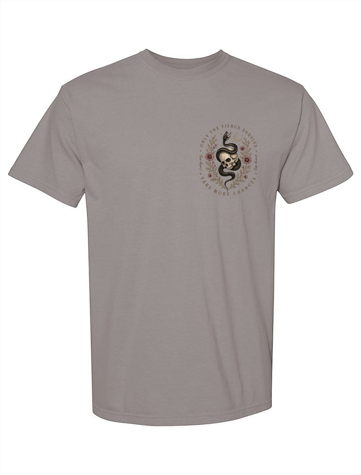 JSD Apparel unisex grey Comfort Colors tee featuring a small chest graphic of a skull, serpent, and floral details.
