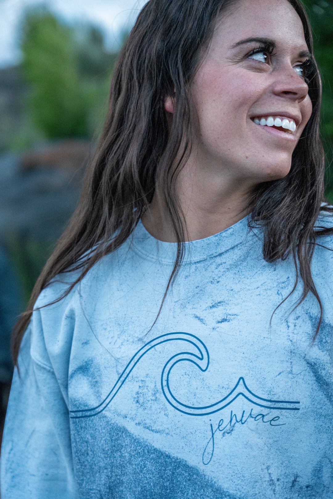 JSD Apparel ocean wash blue crewneck sweatshirt with wave graphic and Jenvae script logo, cotton/poly blend