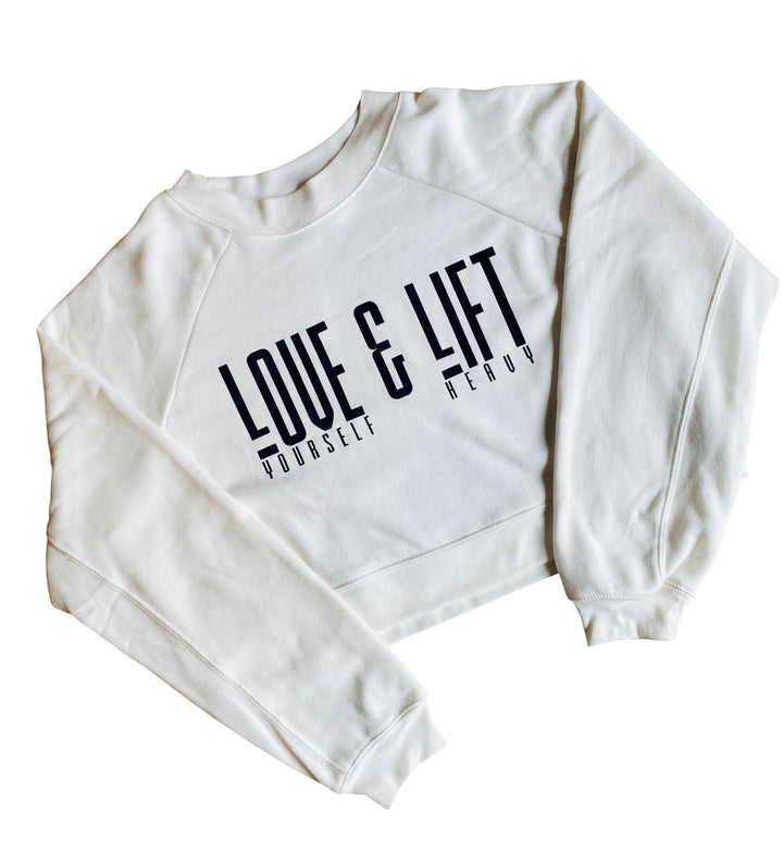 JSD Apparel white cropped fleece pullover with Love Yourself & Lift Heavy graphic print and raglan sleeves